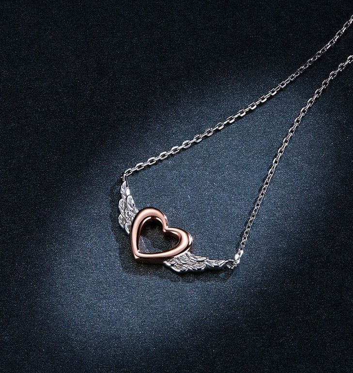 Heart with hot sale wings necklace